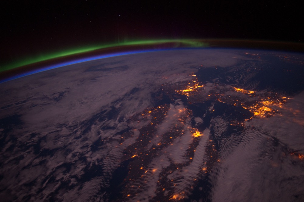 The Northern Lights and aurora borealis, as seen from outer space.