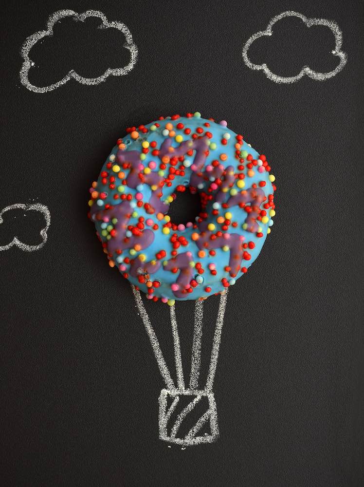 creative chalk drawing photo featuring a colourful doughnut.