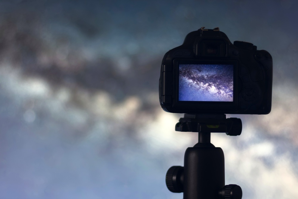 Astrophotography of the Milky Way in a camera live view viewfinder.