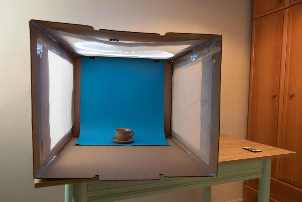An example of a home-made light tent useful for studio-based miniature photography. Mug in center.
