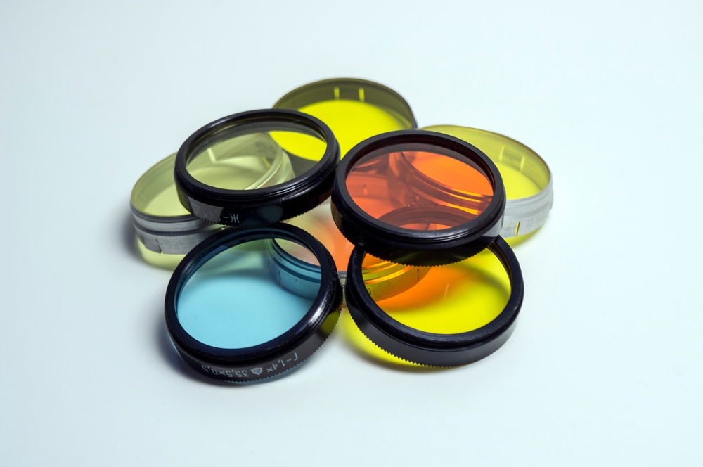 Photograph of various camera lens filters.