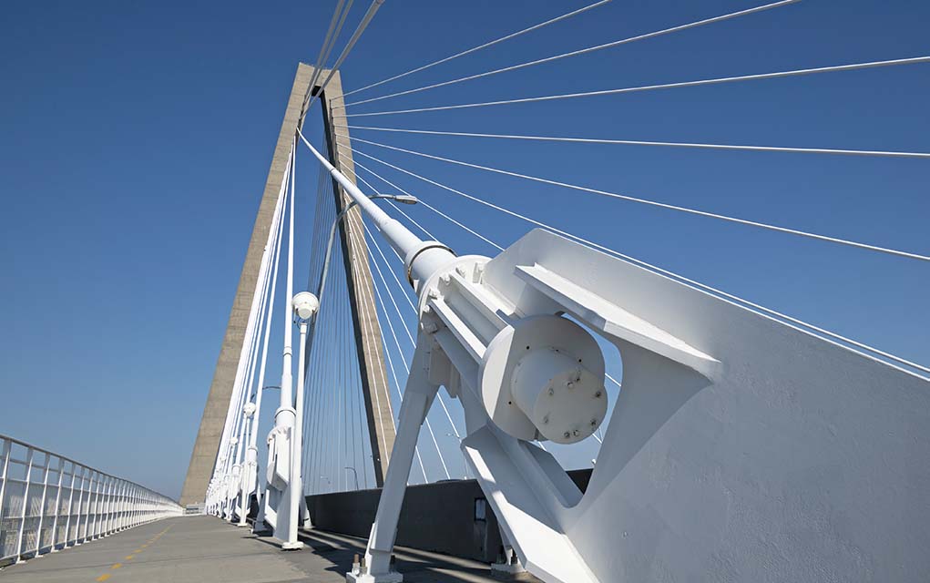 stock image of bridge cable anchorage and walkway.