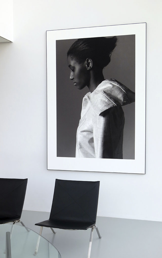  woman portrait print frame on a wall.