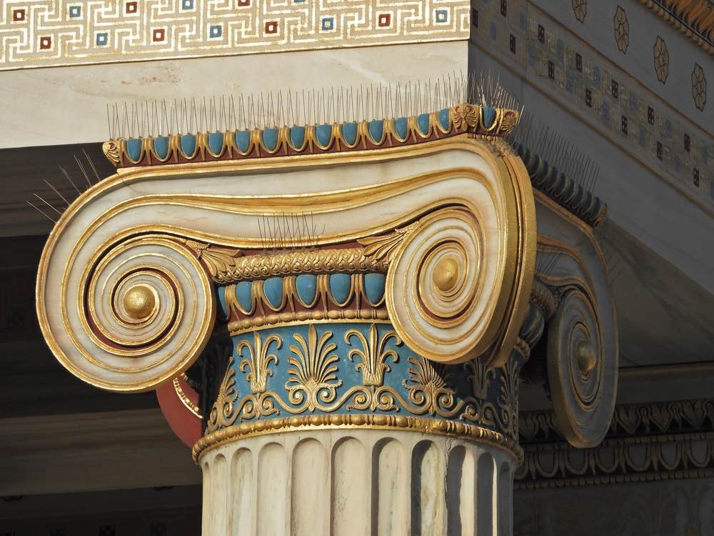 A zoomed in image of a support pillar for some building.
